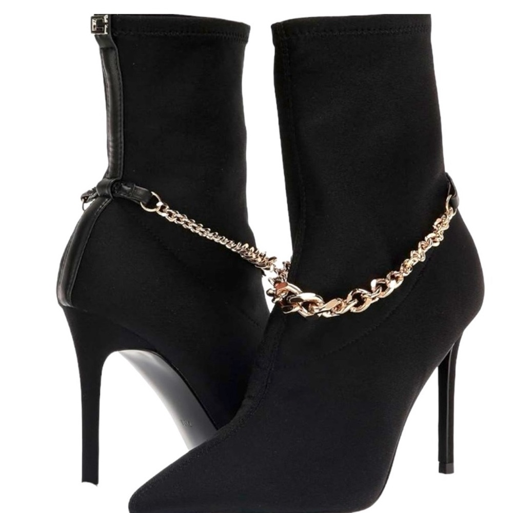 Black stretch Guess booties. Never worn. New with tags. No box. Size 8 1/2